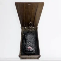 فروشگاه آقای چرمی-جای ریموت چرمی دوبل خودروی کیا رنگ مشکی